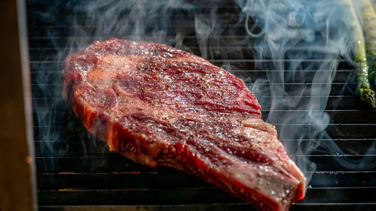 digital probe thermometer in steak